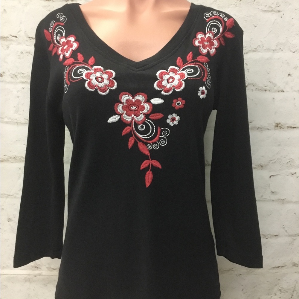Embroidered blouse.